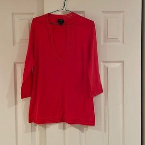 Woman light spring/summer sweater with long decollate